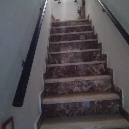 In Guest - Large Quadruple Up To Four People تاورمينا